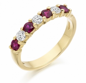 7 Stone Ruby and Diamond Claw Set Half eternity Ring in YG