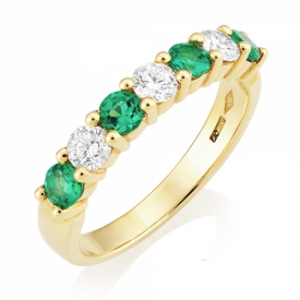 Emerald 0.51ct and GVS Diamond Seven Stone Claw Set Ring