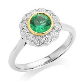Vintage Style Round Emerald and Diamond Ring in Platinum